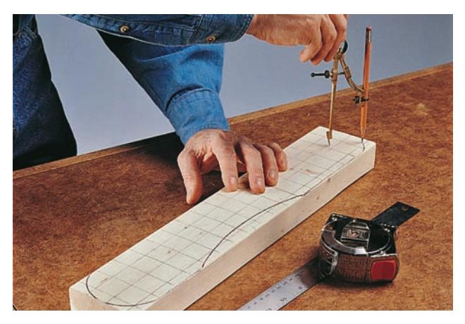 Use a square grid pattern and a compass to draw patterns on your workpiece.
