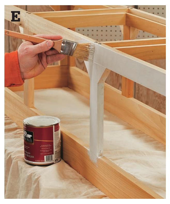 Brush primer onto the wood to seal it before painting.