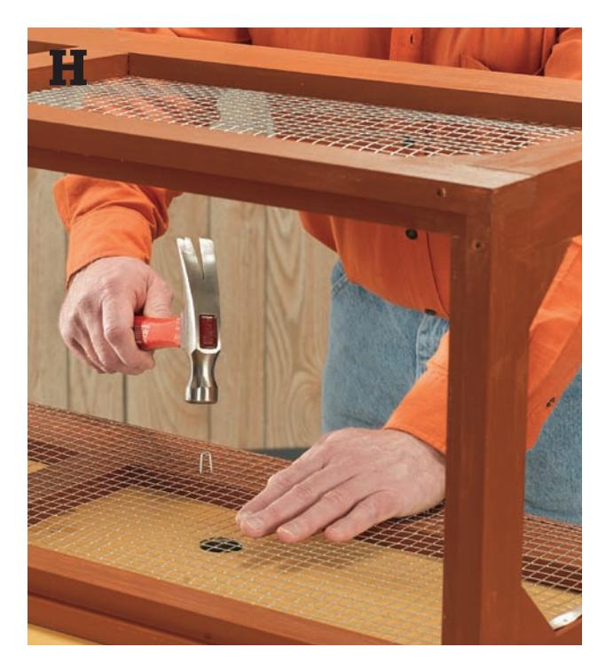 Drive a 1/2-inch fencing staple through the hardware cloth or fencing and into a post.