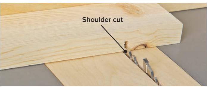Close-up of shoulder cuts made with a table saw and miter gauge.