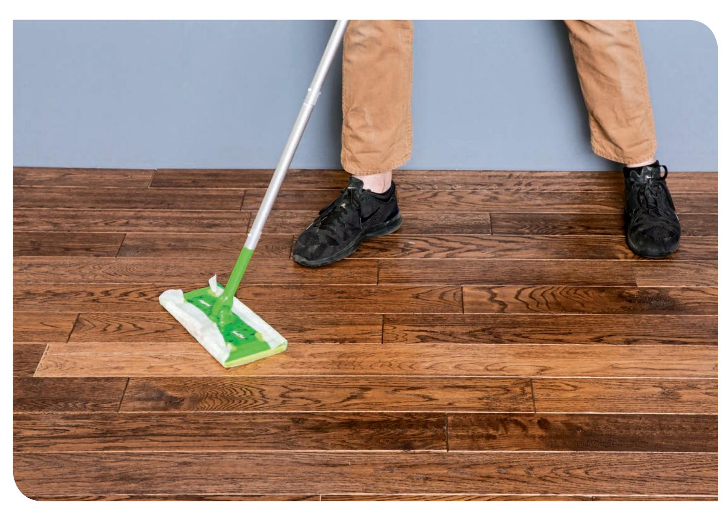 Begin by sweeping, vacuuming, then removing dust from the floor using a pad-mop equipped with a wet pad. Scuff marks can be lightly scrubbed by hand using a soft cloth, not an abrasive pad.