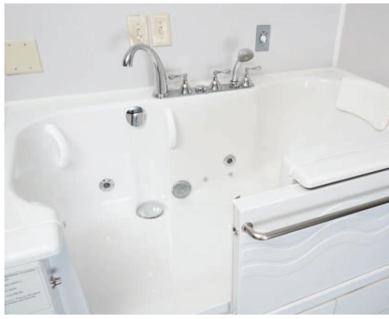 Luxury walk-in tub with jets and chrome fixtures.