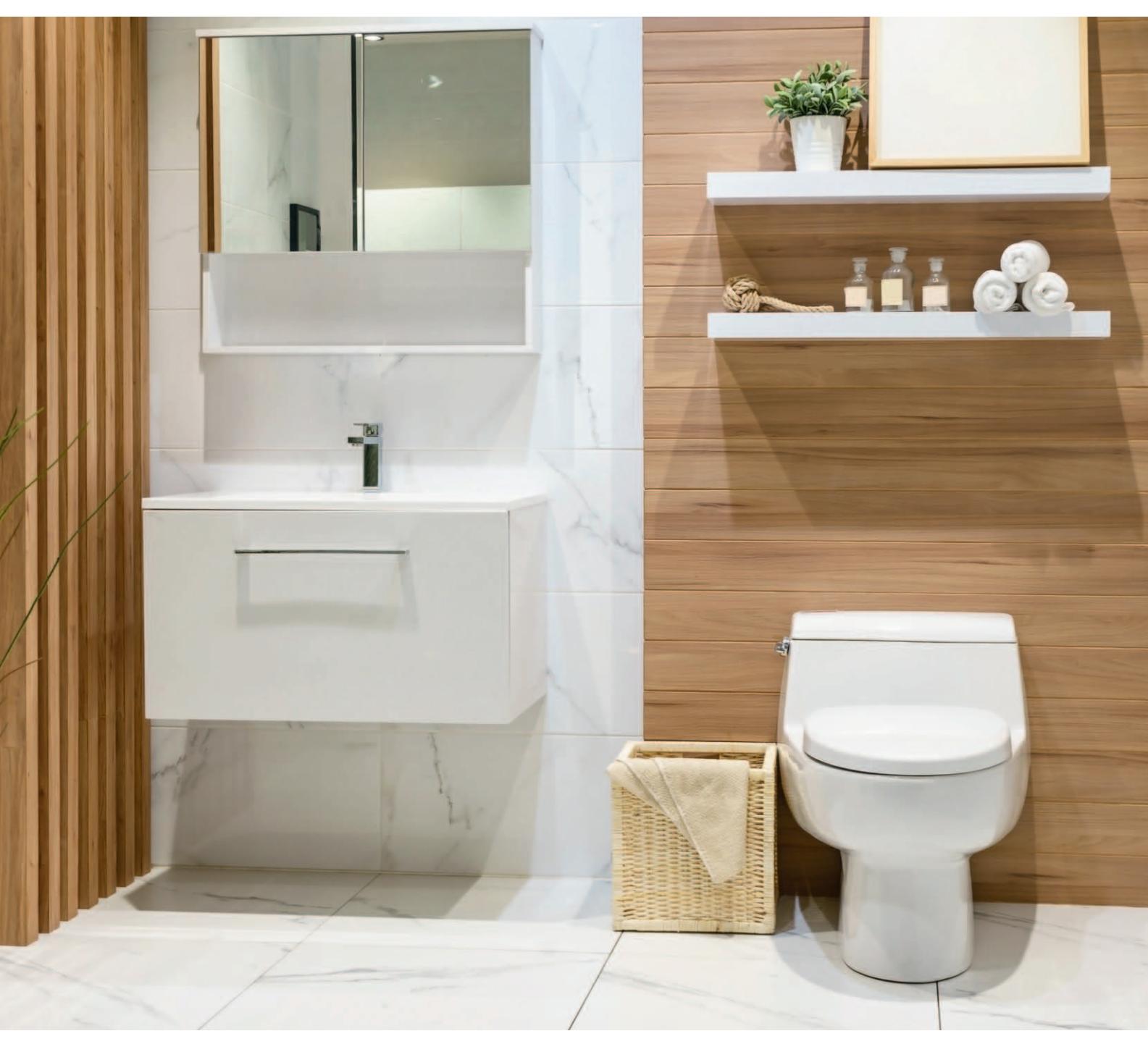 Powder room with wood accents to warm a white space.