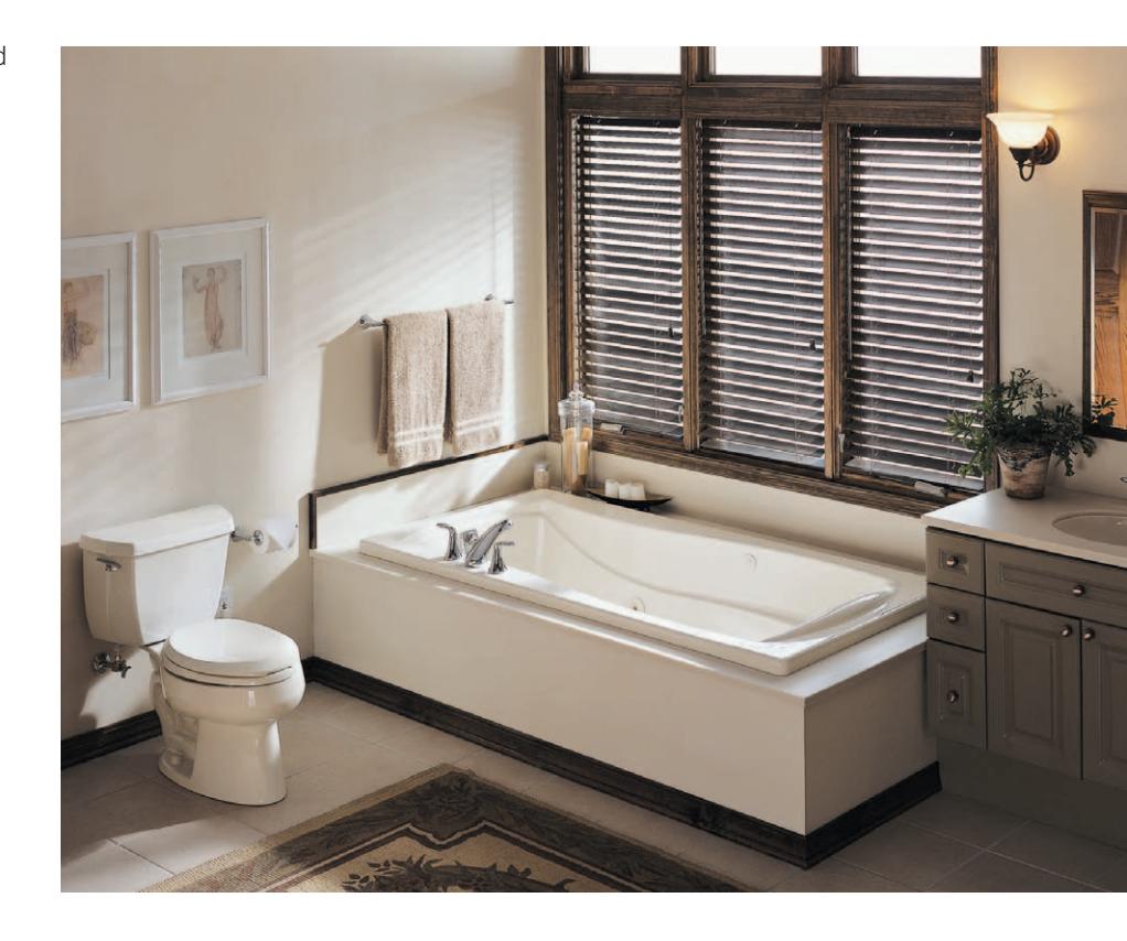 Deck-mounted tub customized to blend with bathroom design.