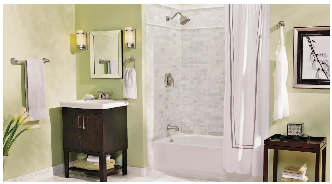 A vanity with legs and a lower shelf, featuring matching hardware.