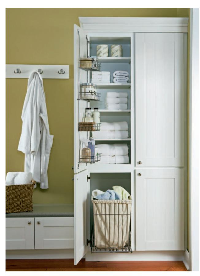 A linen cabinet integrated with other bathroom cabinetry.