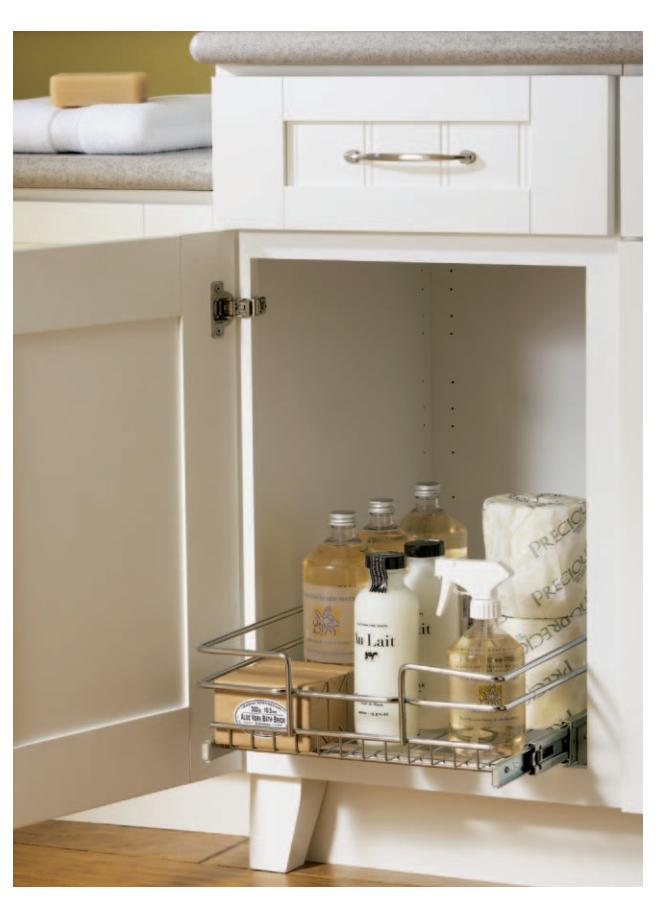 Slide-out storage racks inside a base cabinet.