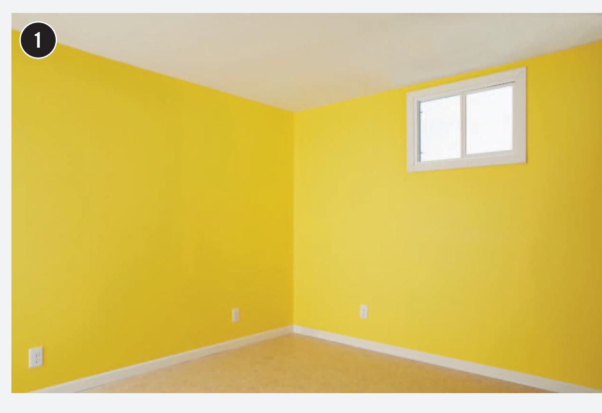 Worker preparing to remove wall covering.