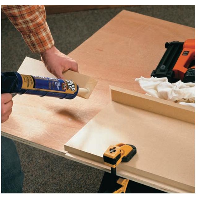 Applying construction adhesive to a joint