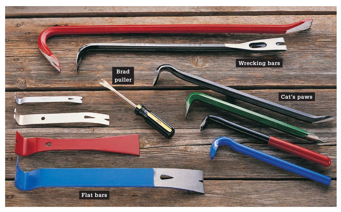 A collection of various prying tools, including wrecking bars, cat's paws, and flat bars.
