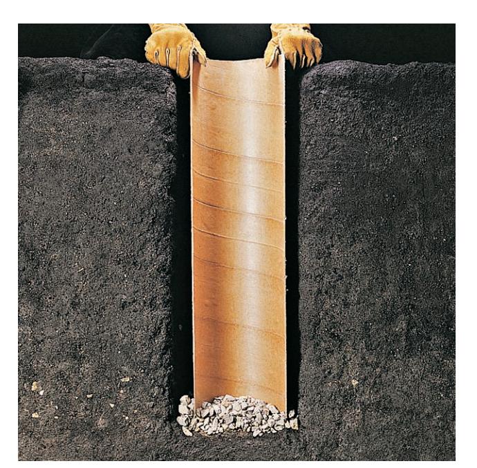 A continuous concrete footing extending below the frost line.