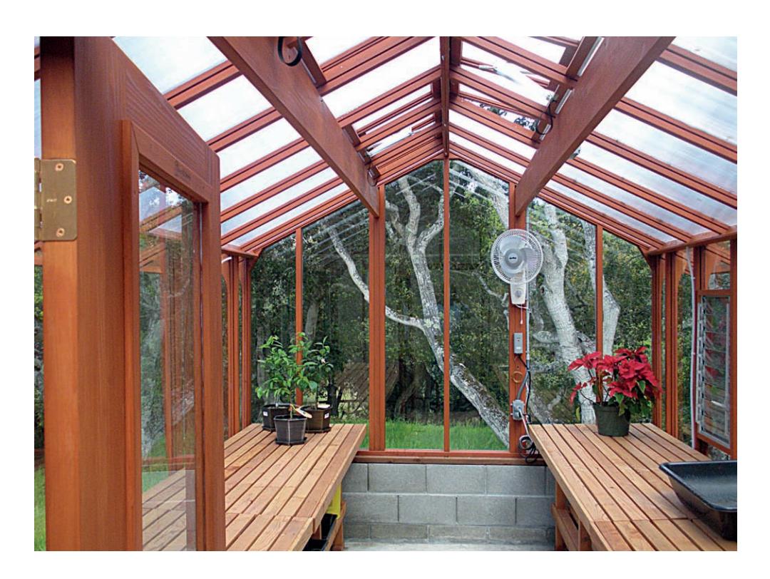 This stunning redwood greenhouse combines the best of both worlds—the beauty and view through clear glass windows on all walls and frosted polycarbonate panels on the roof to diffuse light.