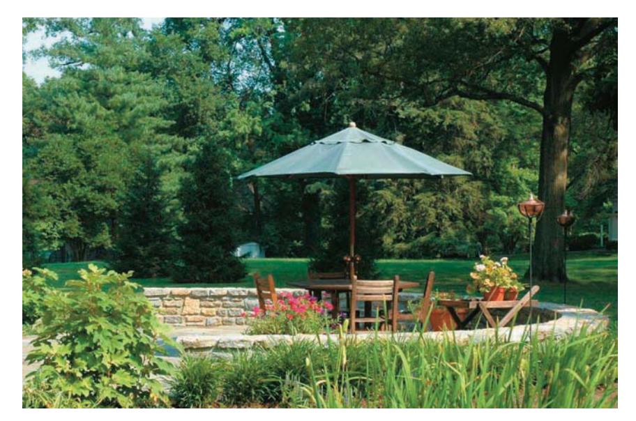 Peninsula patio with a large lawn expanse